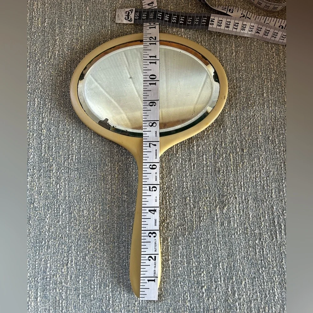 Vintage Handheld Mirror with light yellow Frame